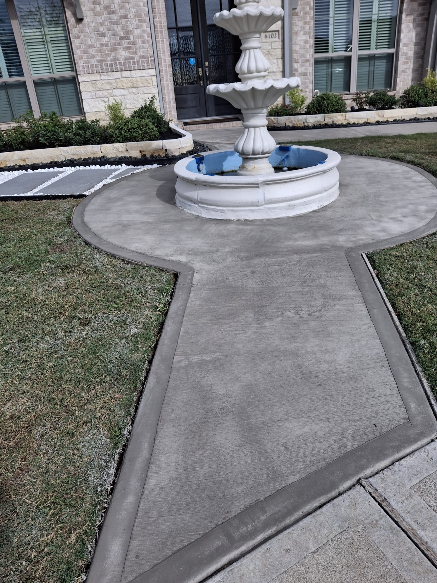 pouring concrete at job site